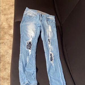 Ripped jeans with fishnets